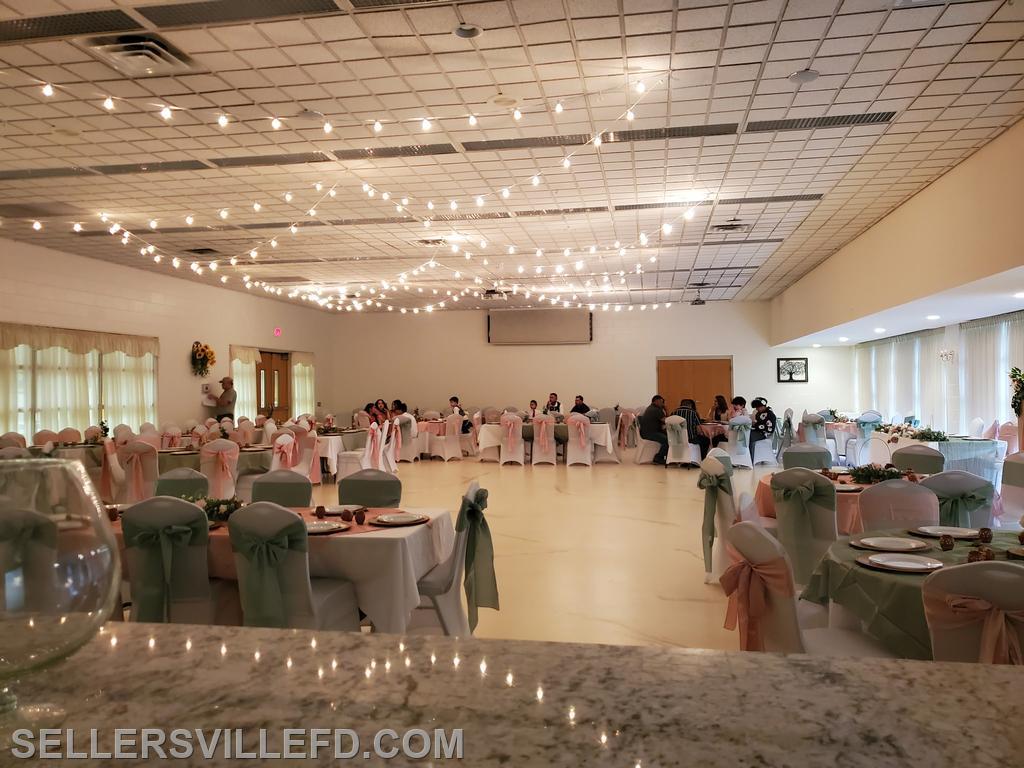 SET UP FOR 160 - FOOD IN HALLWAY MIX OF RECTANGLE AND ROUND TABLES
